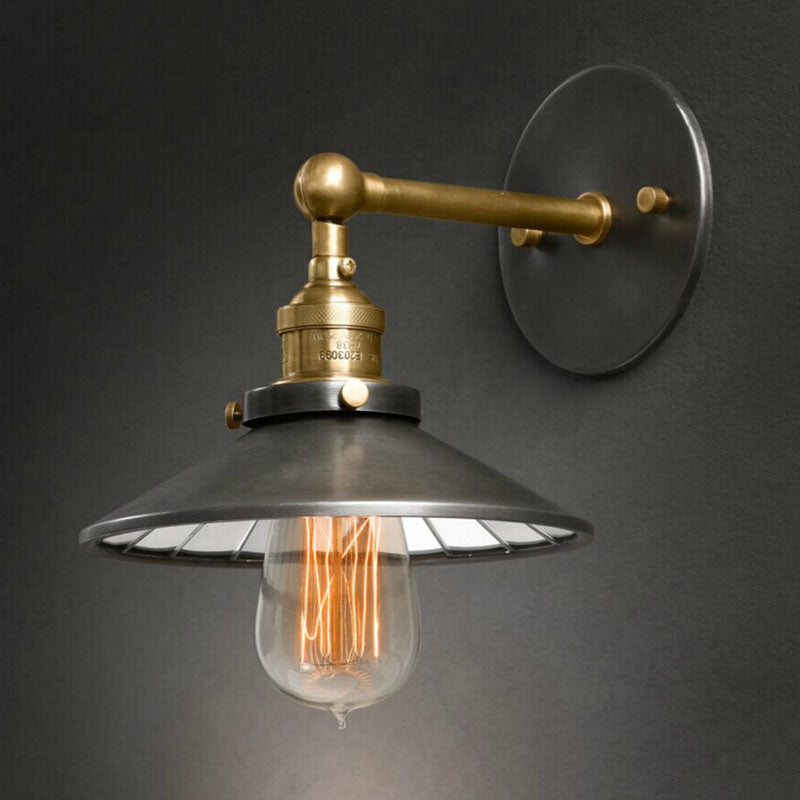 Industrial wall mounted light with metallic shade and reflector